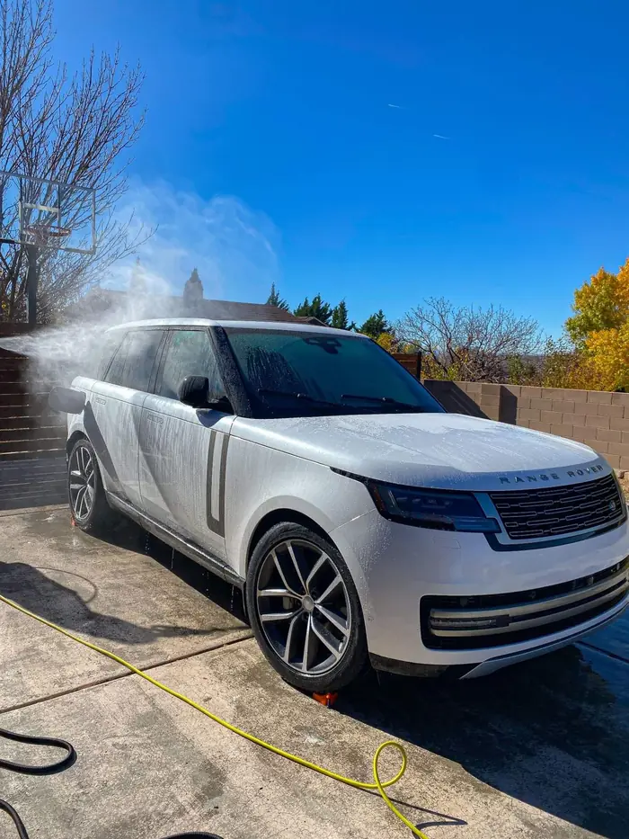 Range Rover being washed on-site in a driveway by Sandia Suds